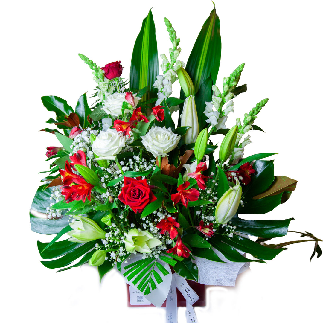 Bouquet of flowers with red and white roses on a white background