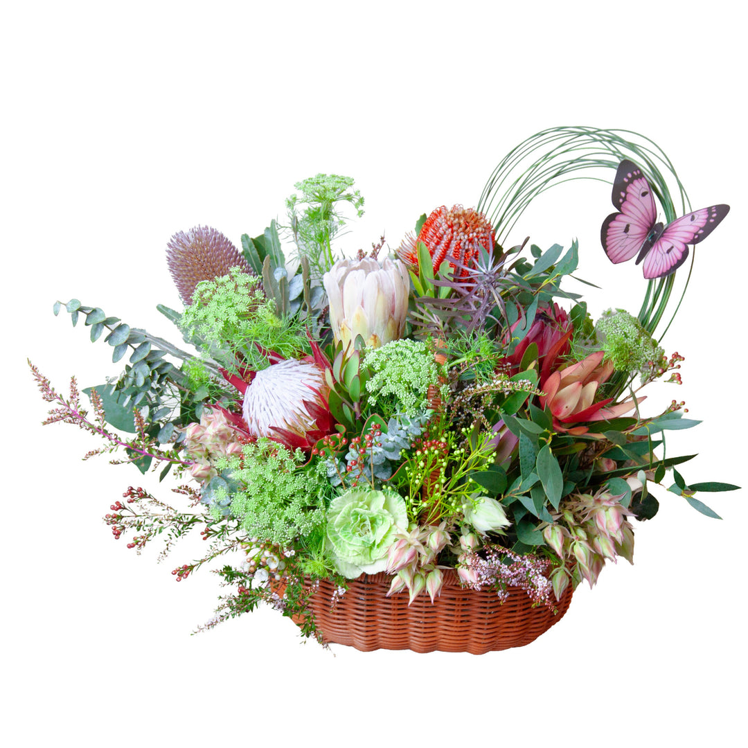 Australian Native Flower Basket arranged in a keepsake basket with fresh seasonal native flowers and foliage.