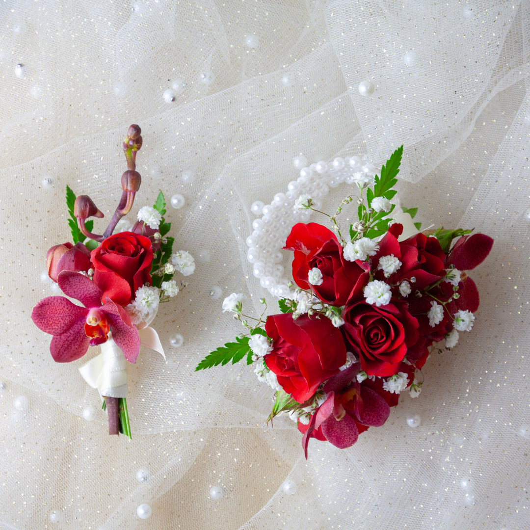 Elegant red rose and Singapore orchid corsage with matching buttonhole, handcrafted for School Formals, graduation dinners and special occasions across Melbourne.
