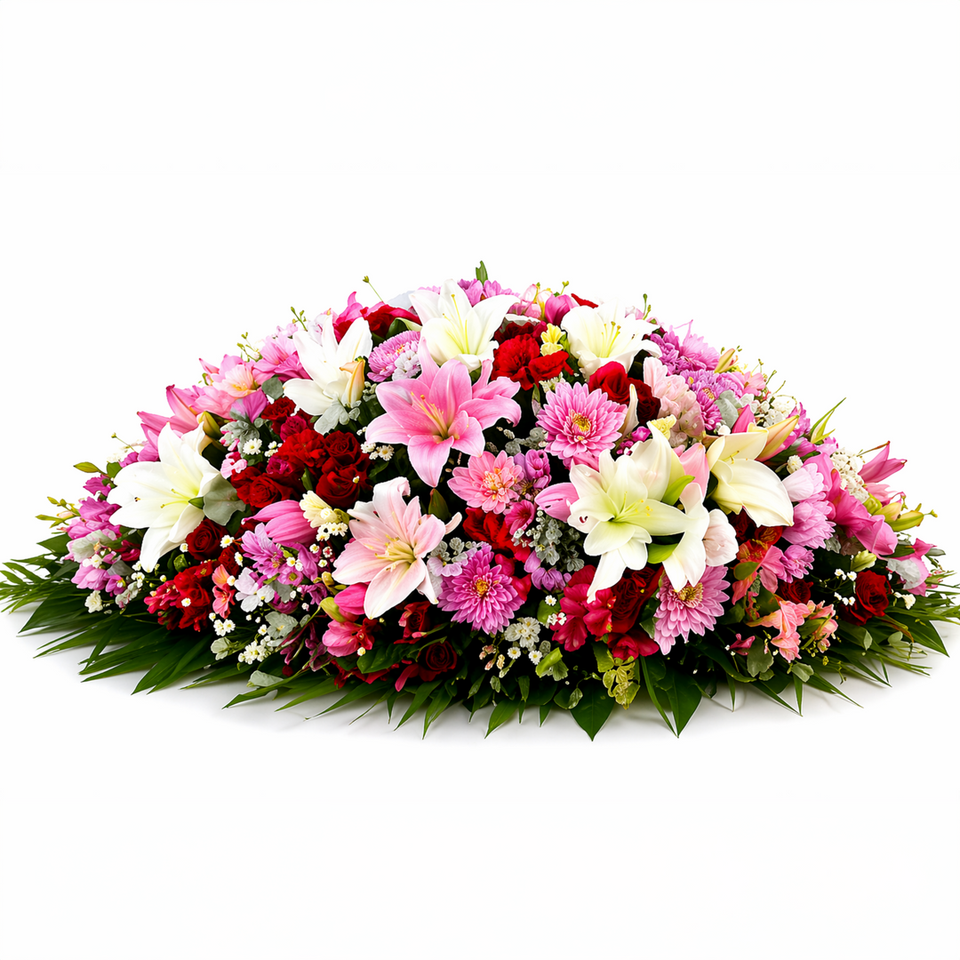 A beautifully crafted sympathy wreath in soft pink and white tones,