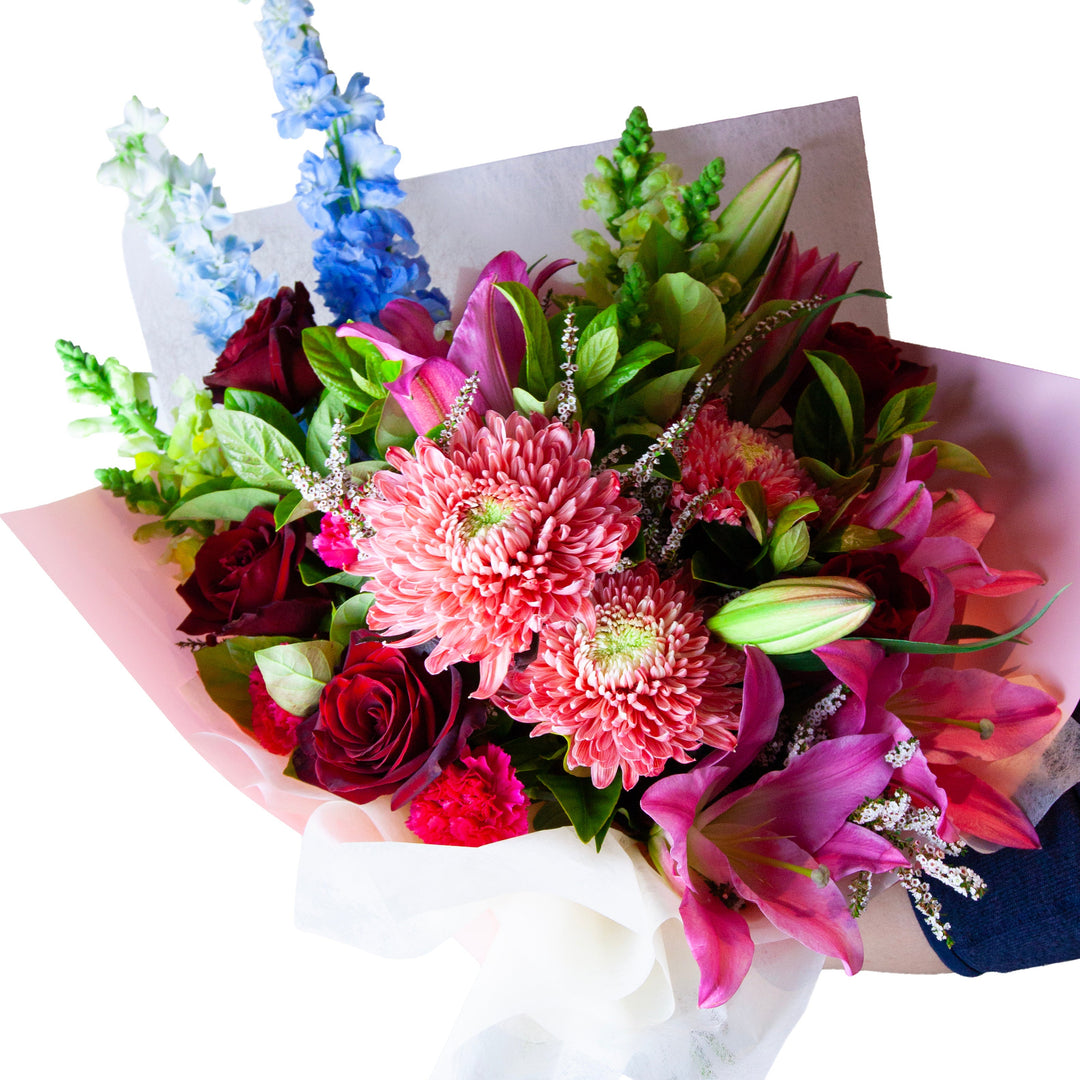 Cranberry Kiss vibrant pink and red flower bouquet featuring red roses and pink lilies by The Flori Shoppe Melbourne