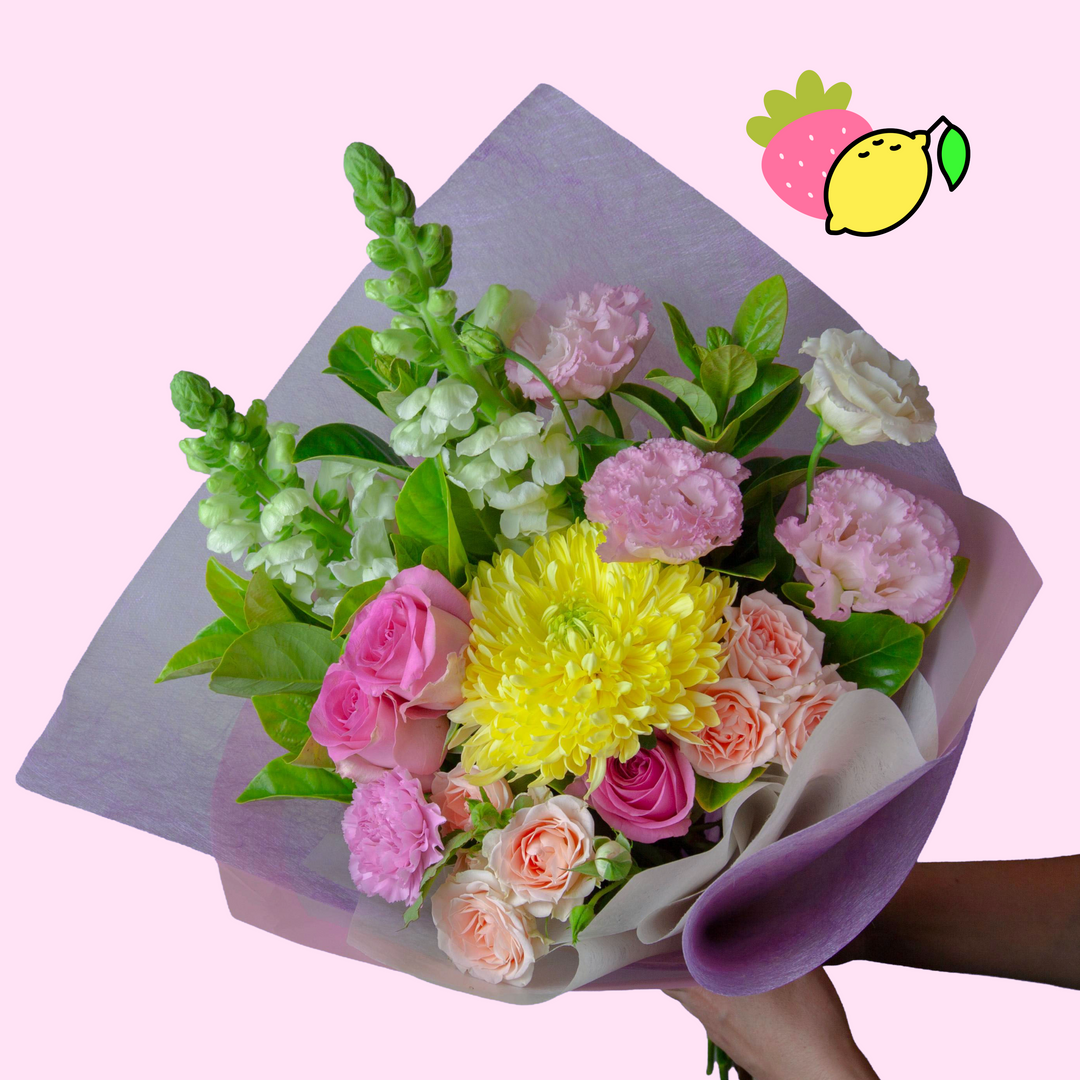 Lemon and Berry bouquet with yellow chrysanthemum, pink roses, white snapdragons and lilac paper in Melbourne