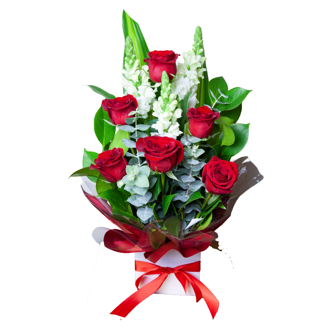 Red Elegance flower box arrangement featuring fresh red roses, white snapdragons, and eucalyptus foliage by The Flori Shoppe Melbourne.