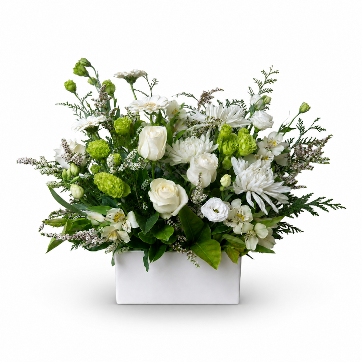 White Beauty white and green flower arrangement featuring white roses, chrysanthemums, lisianthus and lush greenery